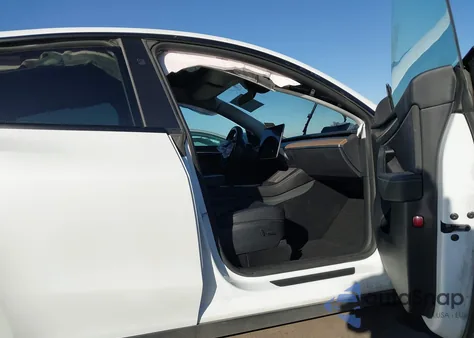 2023 Tesla Model Y Awd/Long Range Dual Motor All-Wheel Drive from USA, damaged, VIN 7SAYGDEE1PF814375